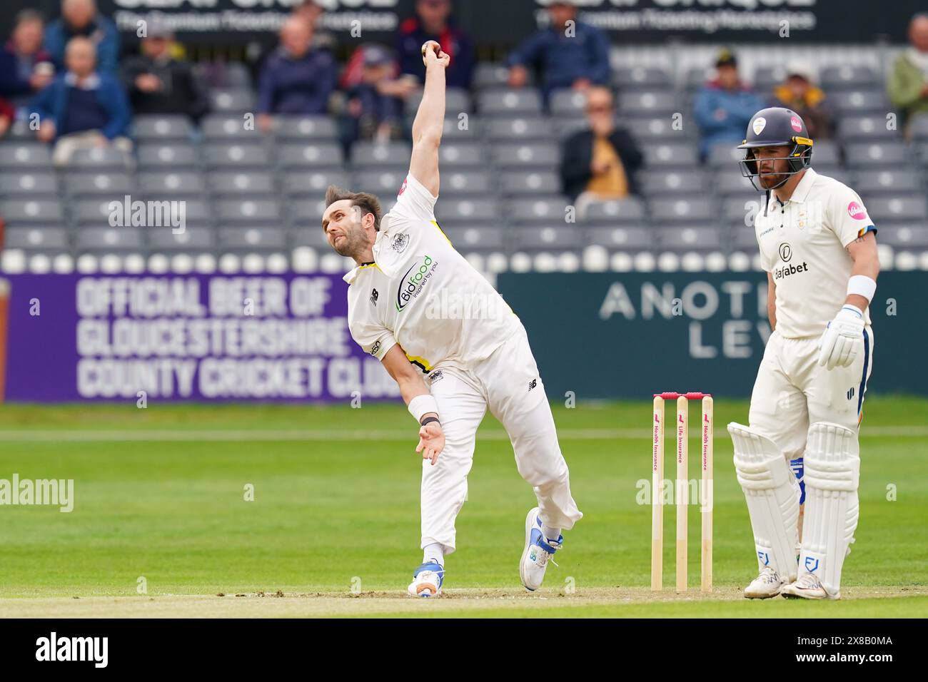 Bristol, UK, 24 May 2024. Gloucestershire's Matt Taylor bowling during the Vitality County Championship match between Gloucestershire and Derbyshire. Credit: Robbie Stephenson/Gloucestershire Cricket/Alamy Live News Stock Photo