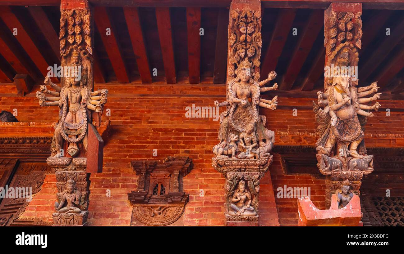 Wooden Carving Details of Hindu Deities on Mulchowk, Patan Darbar Square, Patan, Kathmandu, Nepal. Stock Photo