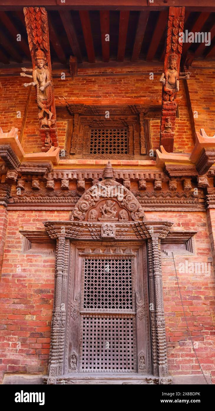 Wooden Carving Details of Hindu Deities on Mulchowk, Patan Darbar Square, Patan, Kathmandu, Nepal. Stock Photo