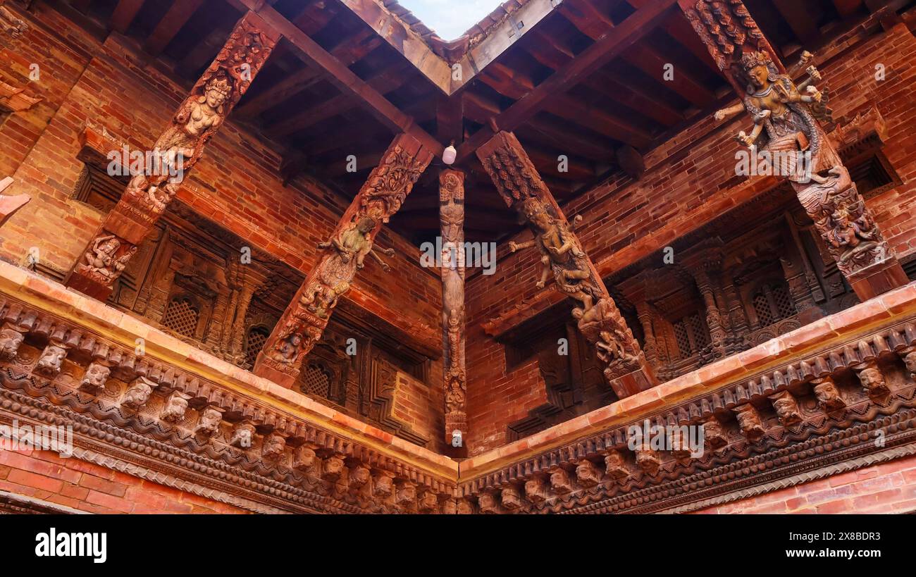 Wooden Carving Details of Hindu Deities on Mulchowk, Patan Darbar Square, Patan, Kathmandu, Nepal. Stock Photo