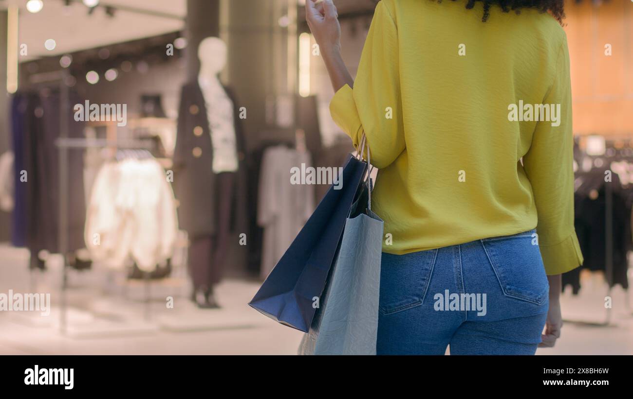 Back view woman black jeans hi-res stock photography and images - Alamy