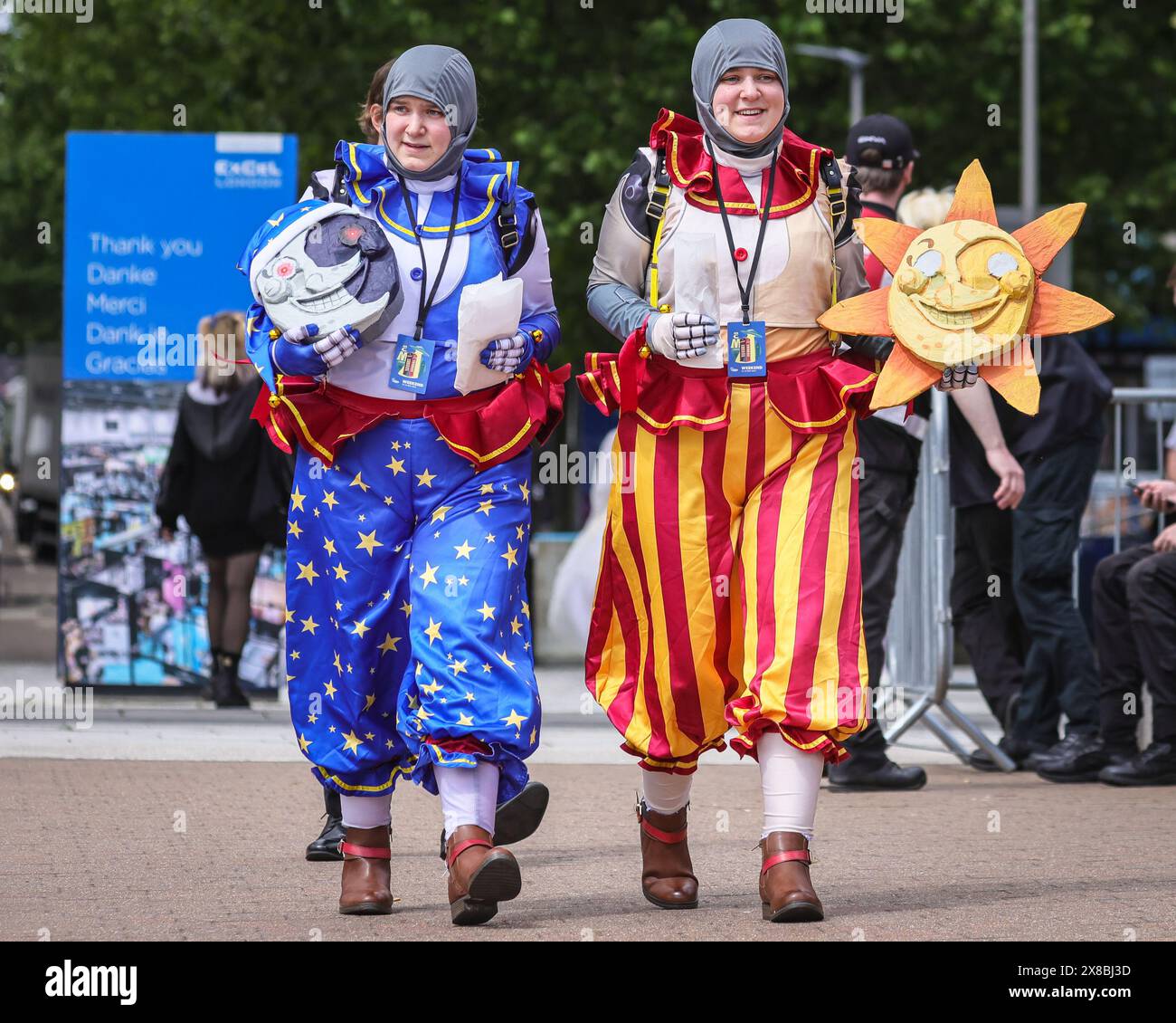 London, UK. 24th May, 2024. The Sun and Moon from 'Five Nights at Freddy's'. MCM Comic Con returns to London's ExCel this weekend. Cosplayers, fans of anime, comics, games and film come together for this large three day event from 24-26 May. (people in pic were asked for permission to photograph) Credit: Imageplotter/Alamy Live News Stock Photo