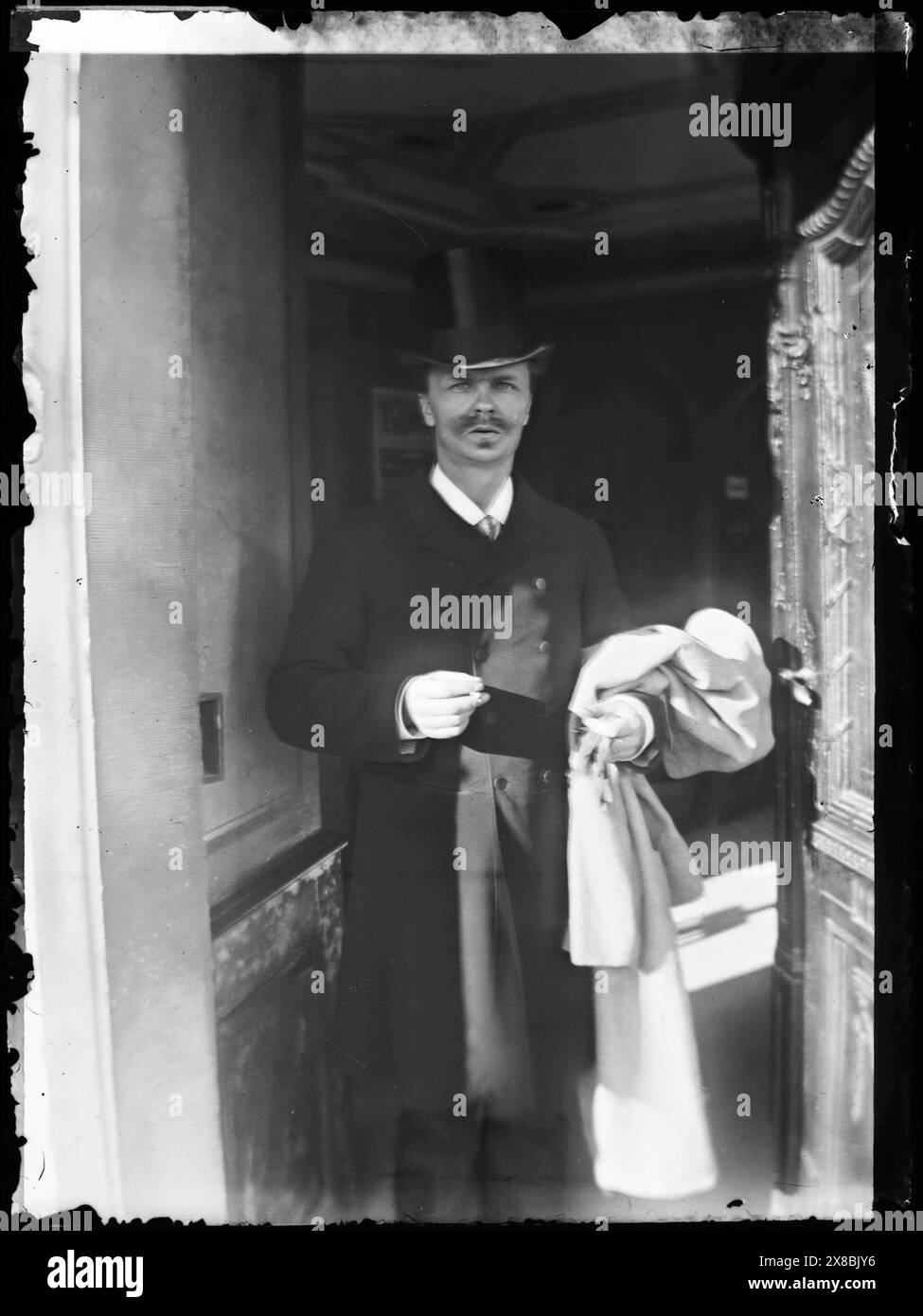 August Strindberg, smoking a cigarette, wearing a hat. Gersau, Switzerland, 1886 - Photo by Siri von Essen Stock Photo