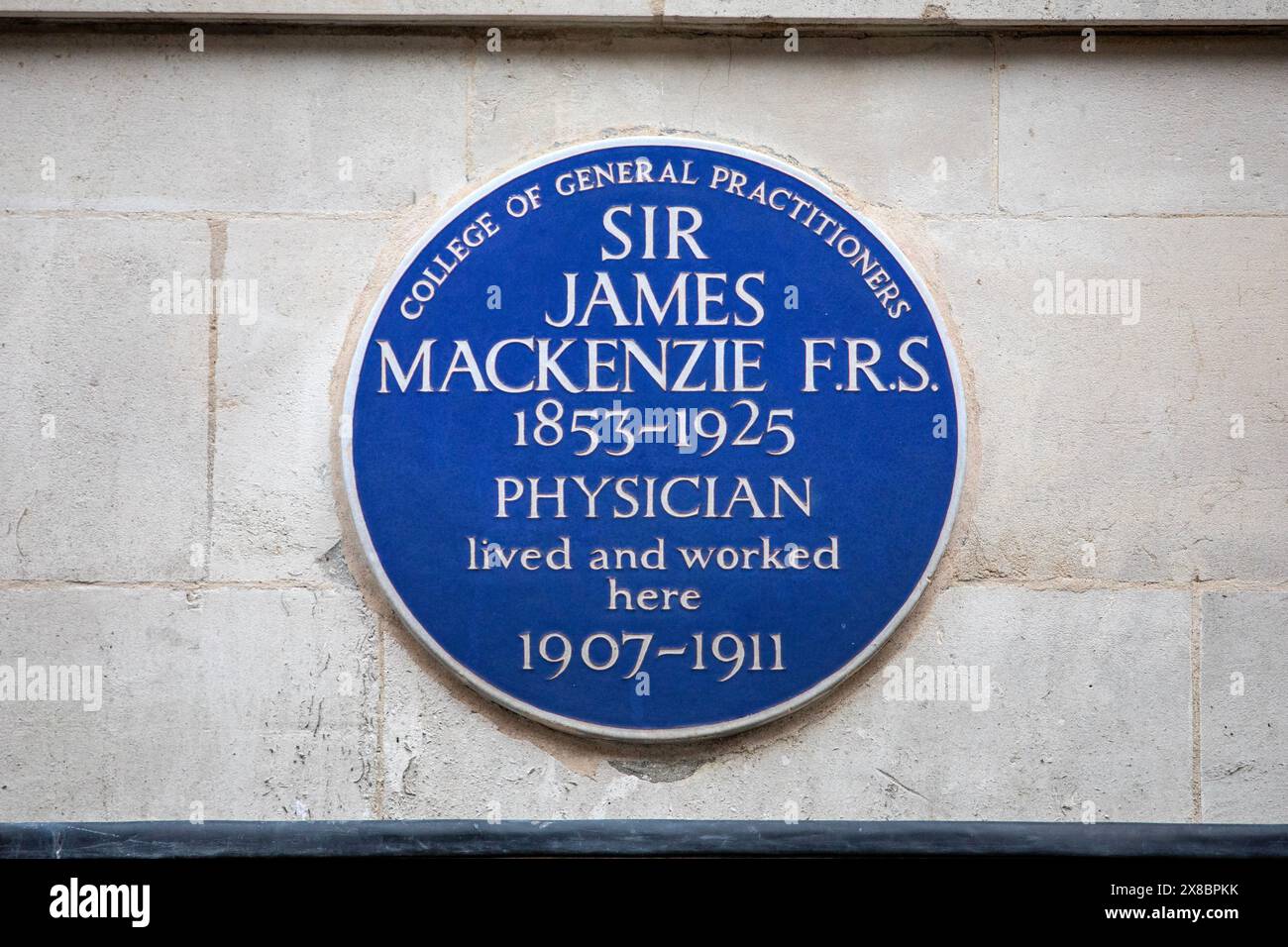 London, UK - March 18th 2024: A blue plaque on Bentinck Street in London, marking where physician Sir James Mackenzie lived and worked. Stock Photo