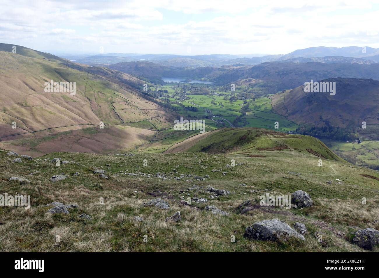 Great Tongue and Grasmere on Wainwrights Coast to Coast path to Patterdale from Fairfield in the Lake District National Park, Cumbria, England, UK Stock Photo