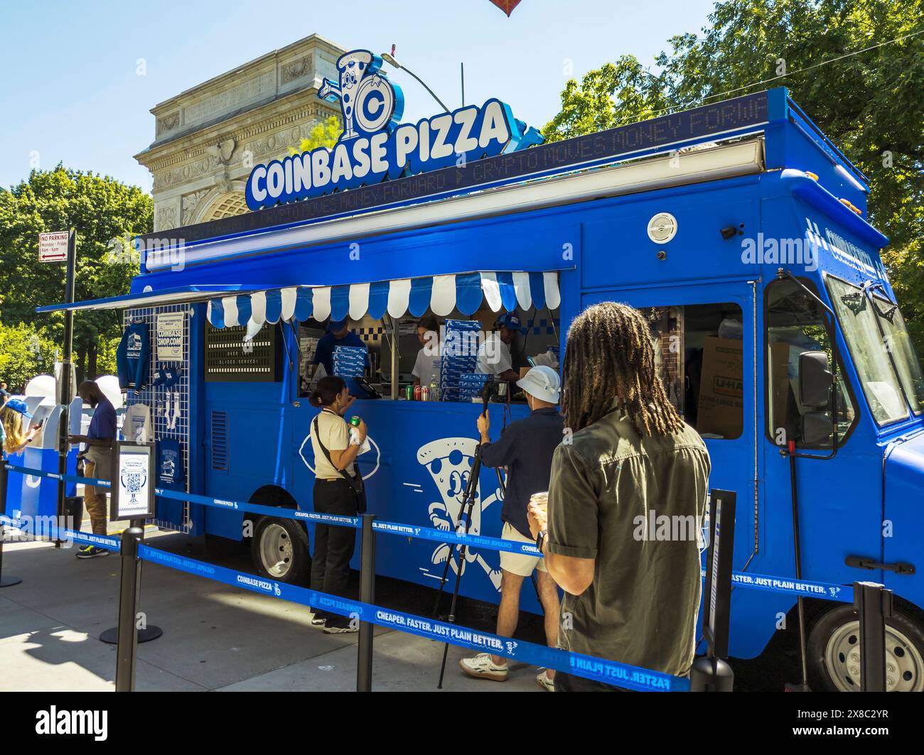 Brand activation for the cryptocurrency exchange Coinbase in Greenwich  Village in New York on Wednesday, May 22, 2024. By downloading the Coinbase  Wallet onto their phones participants could buy a slice of