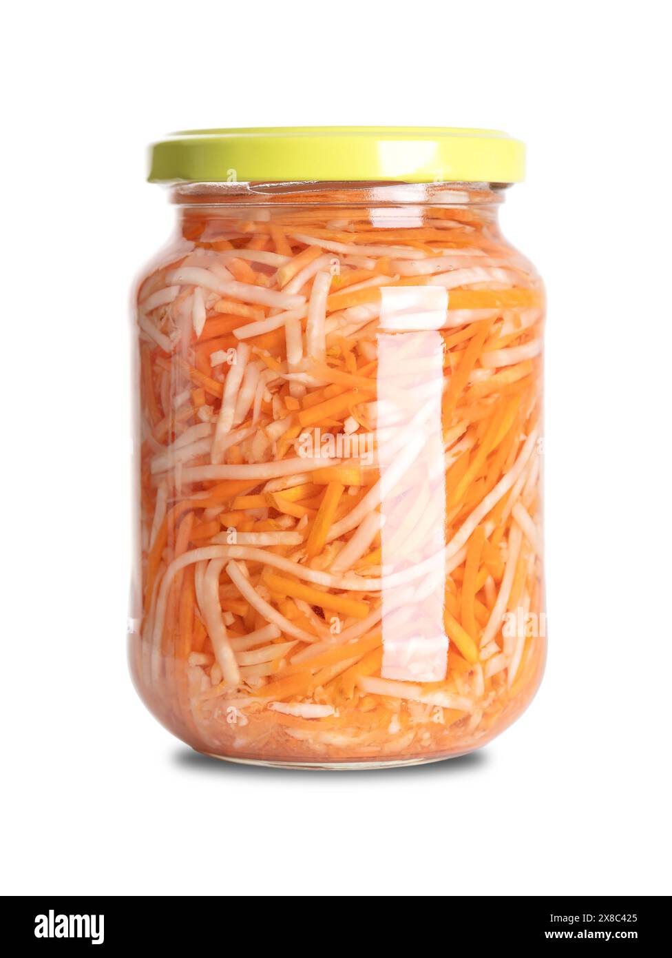 Pickled celeriac and carrot salad in a glass jar. Strips of celery root or knob celery, and carrot strips, pasteurized and preserved in vinegar brine. Stock Photo