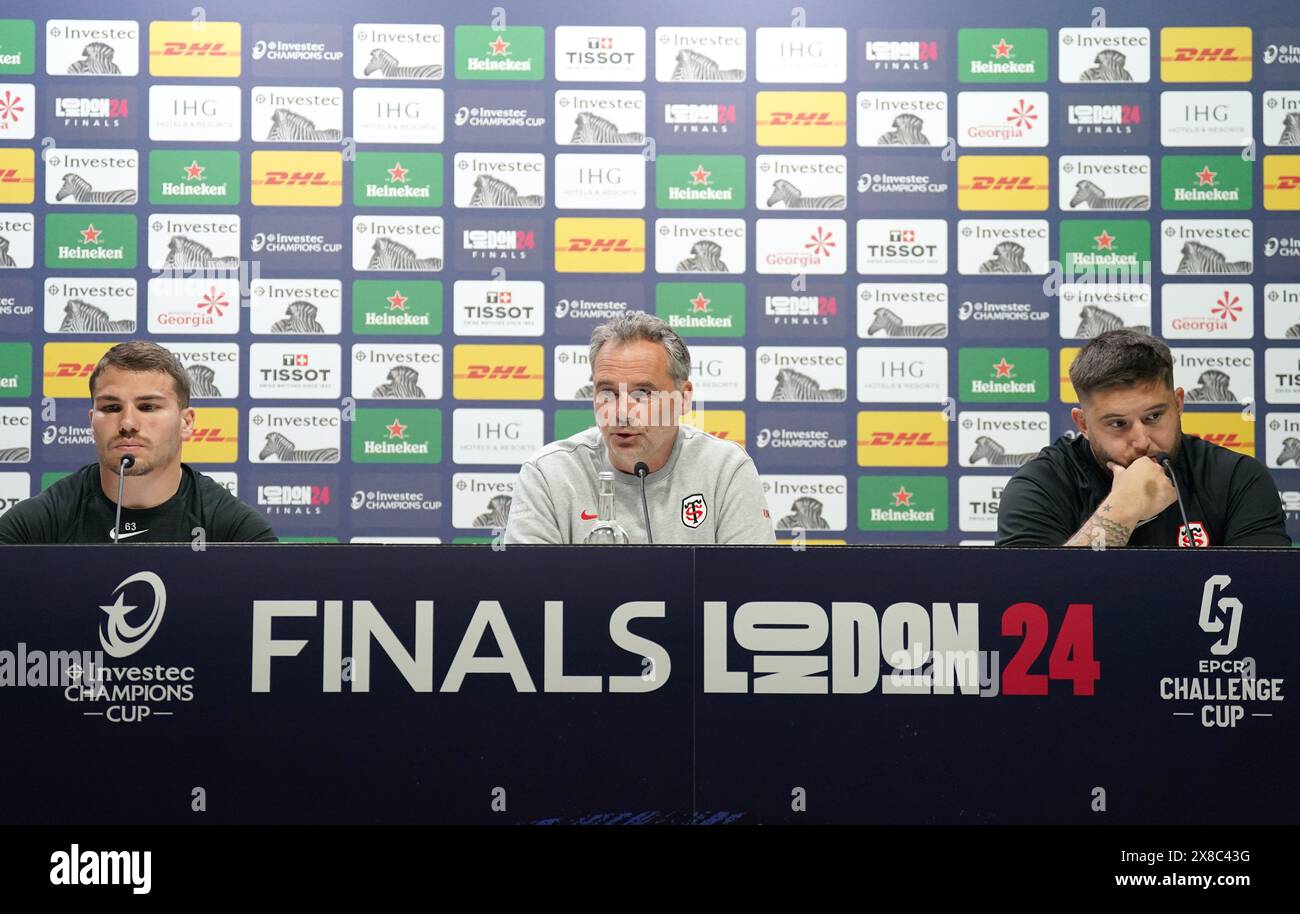 Stade Toulousain's Antoine Dupont, head coach Ugo Mola and Cyril Baille