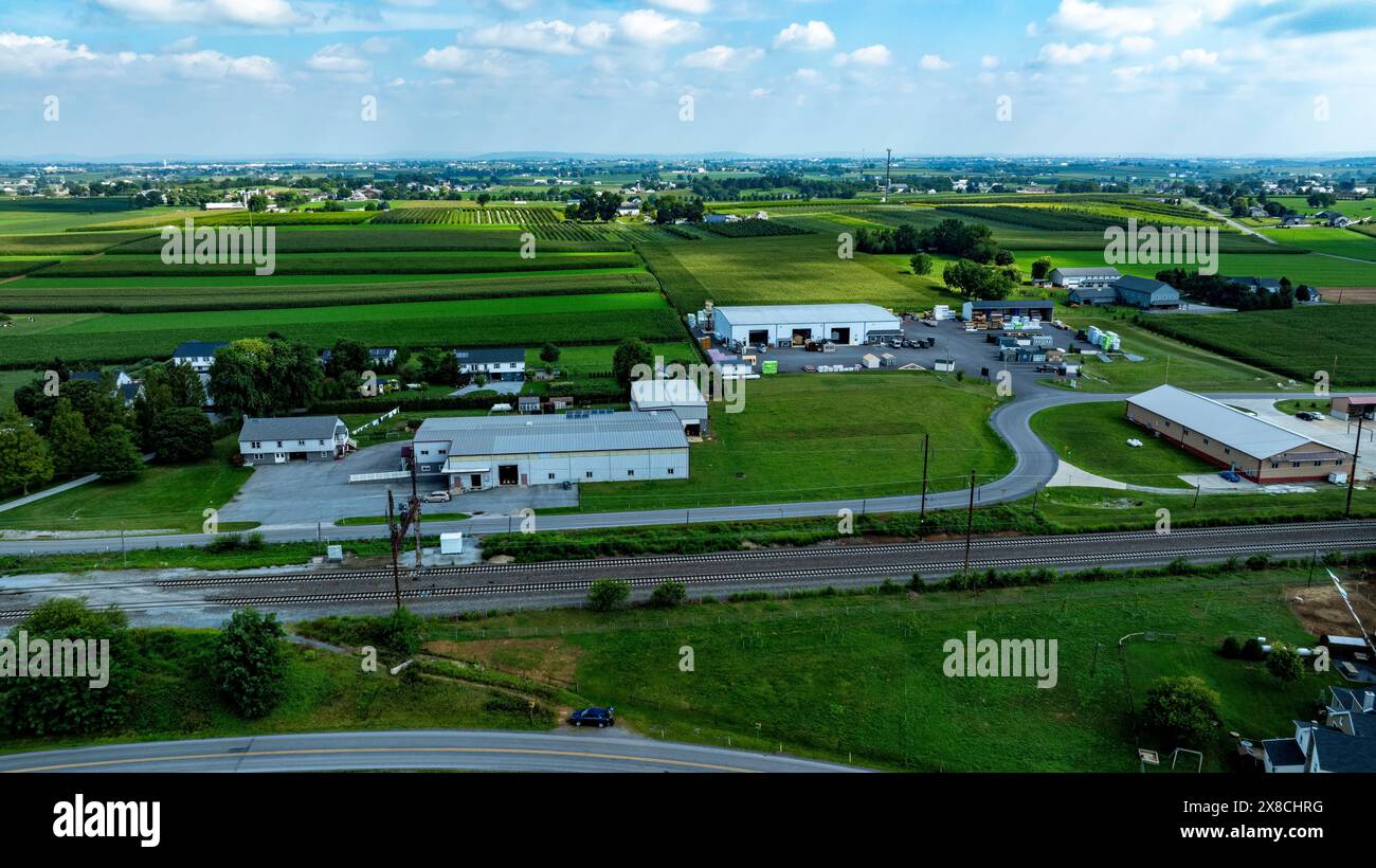 An Aerial View of Rural Community with Farms, Homes, and Industrial ...
