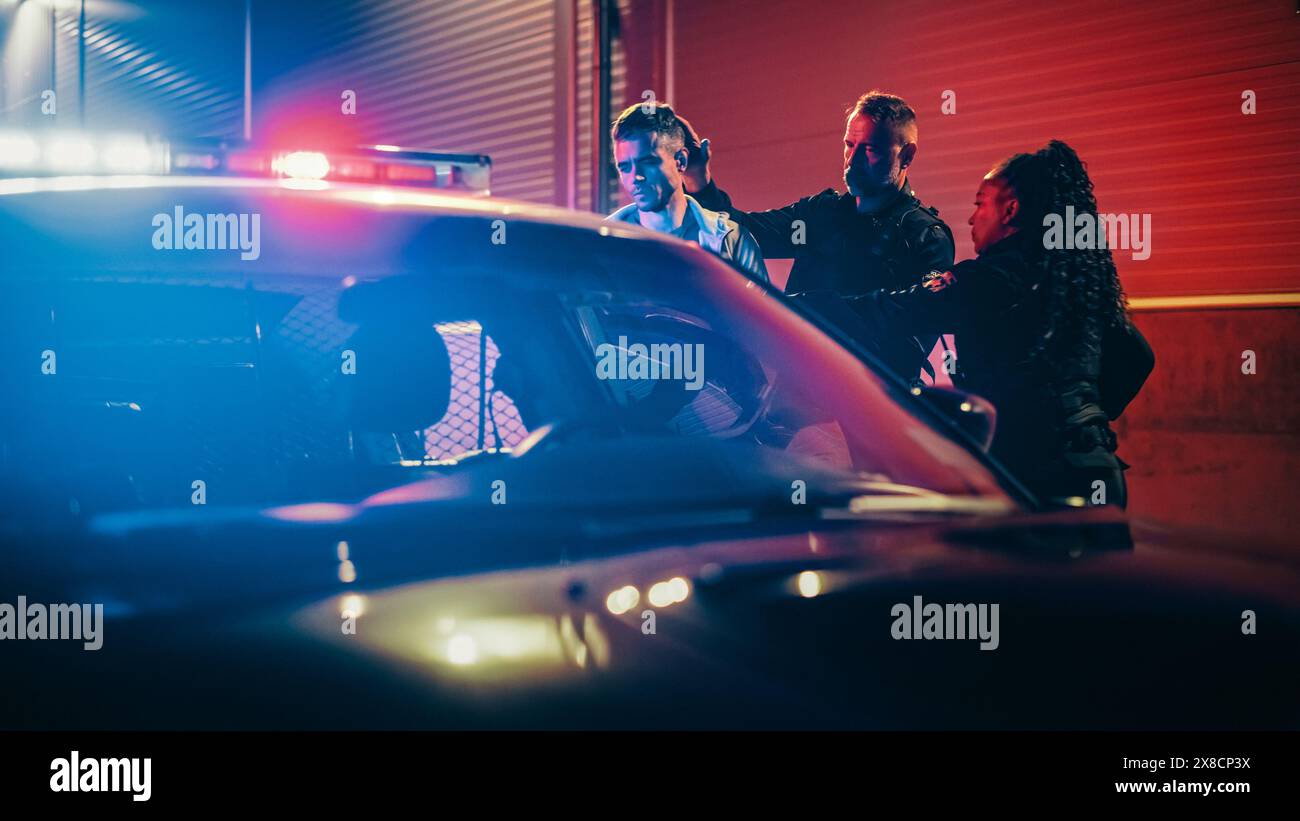 Female police officer arresting woman hi-res stock photography and ...