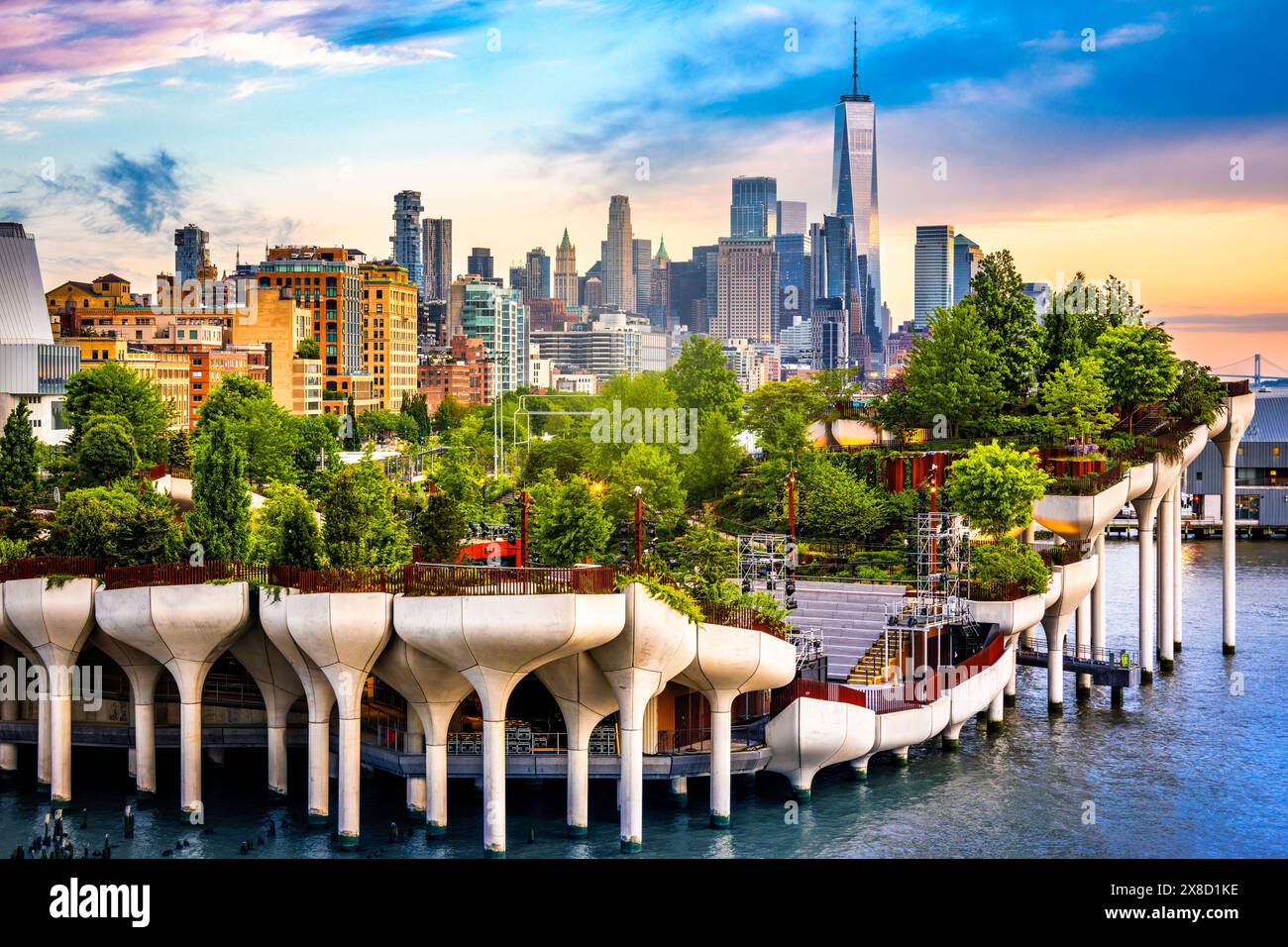 View of Lower Manhattan skyline at sunset, behind the Little Island public park. Stock Photo