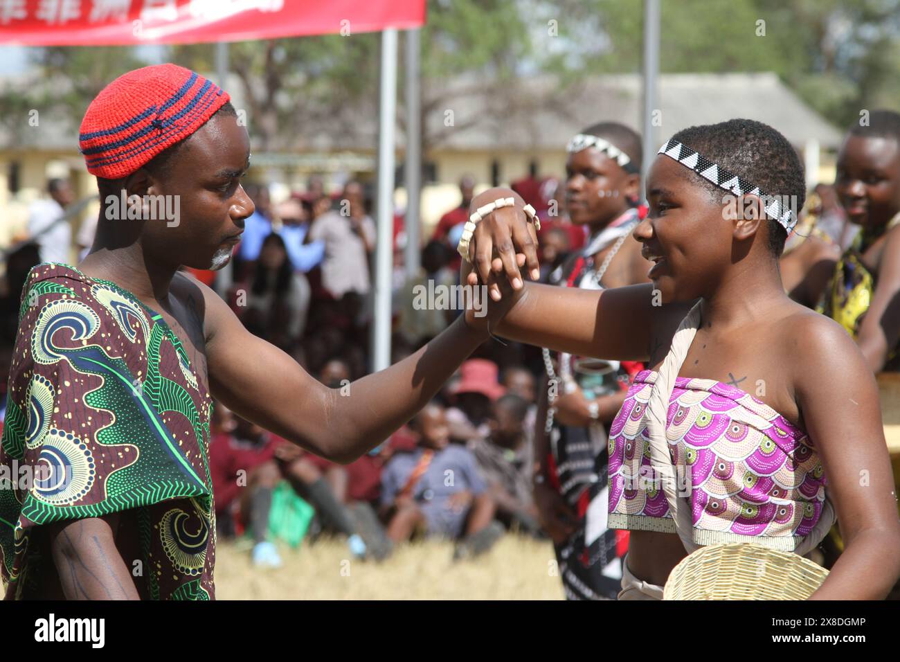Goromonzi, Zimbabwe. 24th May, 2024. People in African attire perform a