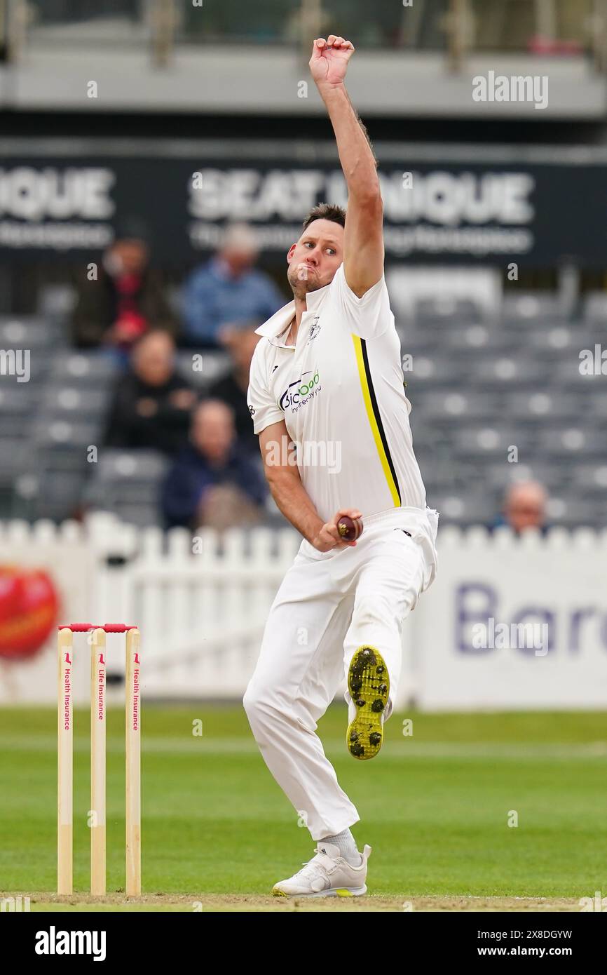 Bristol, UK, 24 May 2024. Gloucestershire's Beau Webster bowling during the Vitality County Championship match between Gloucestershire and Derbyshire. Credit: Robbie Stephenson/Gloucestershire Cricket/Alamy Live News Stock Photo