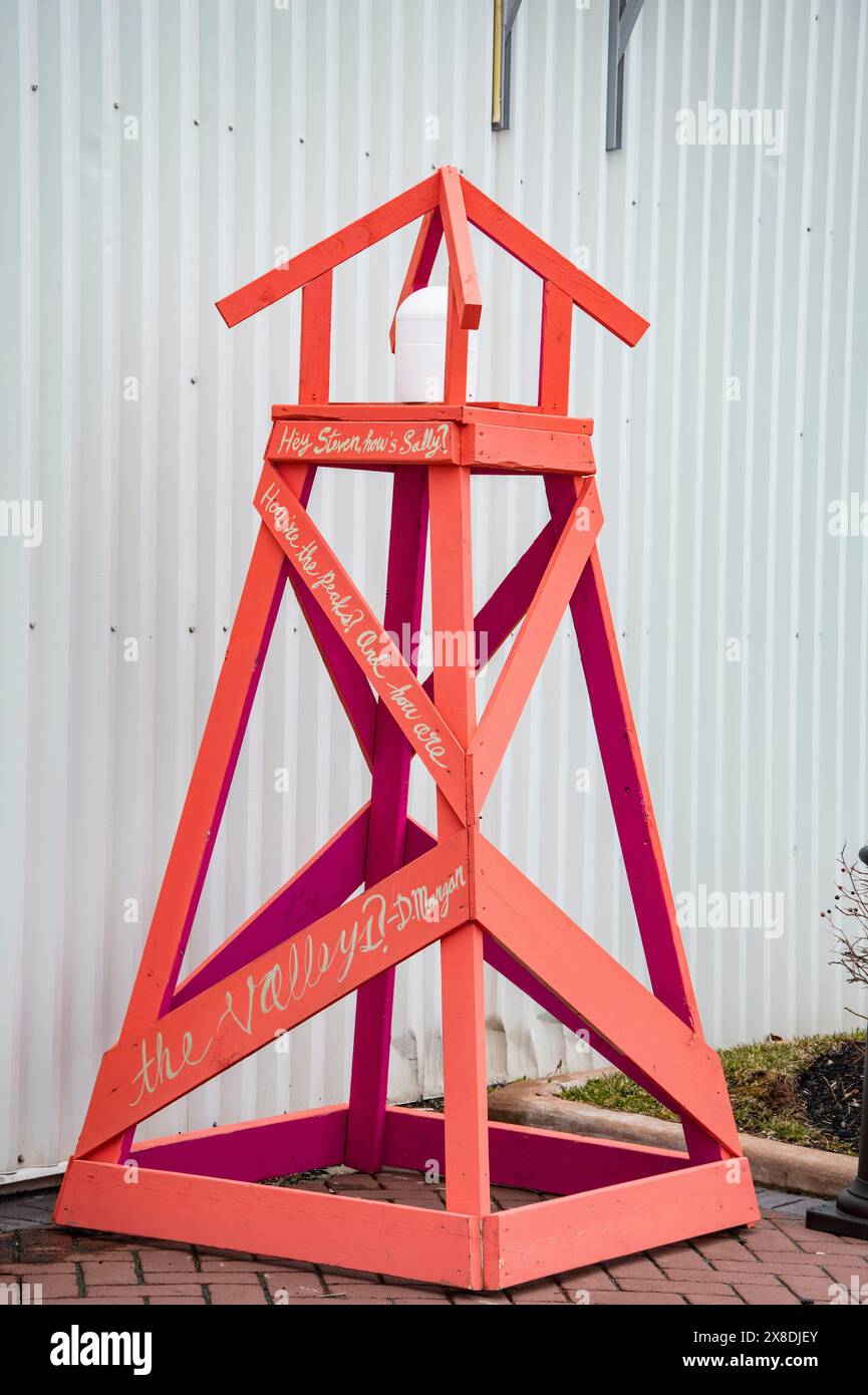 Decorative red lighthouse structure with messages at the wharf in ...