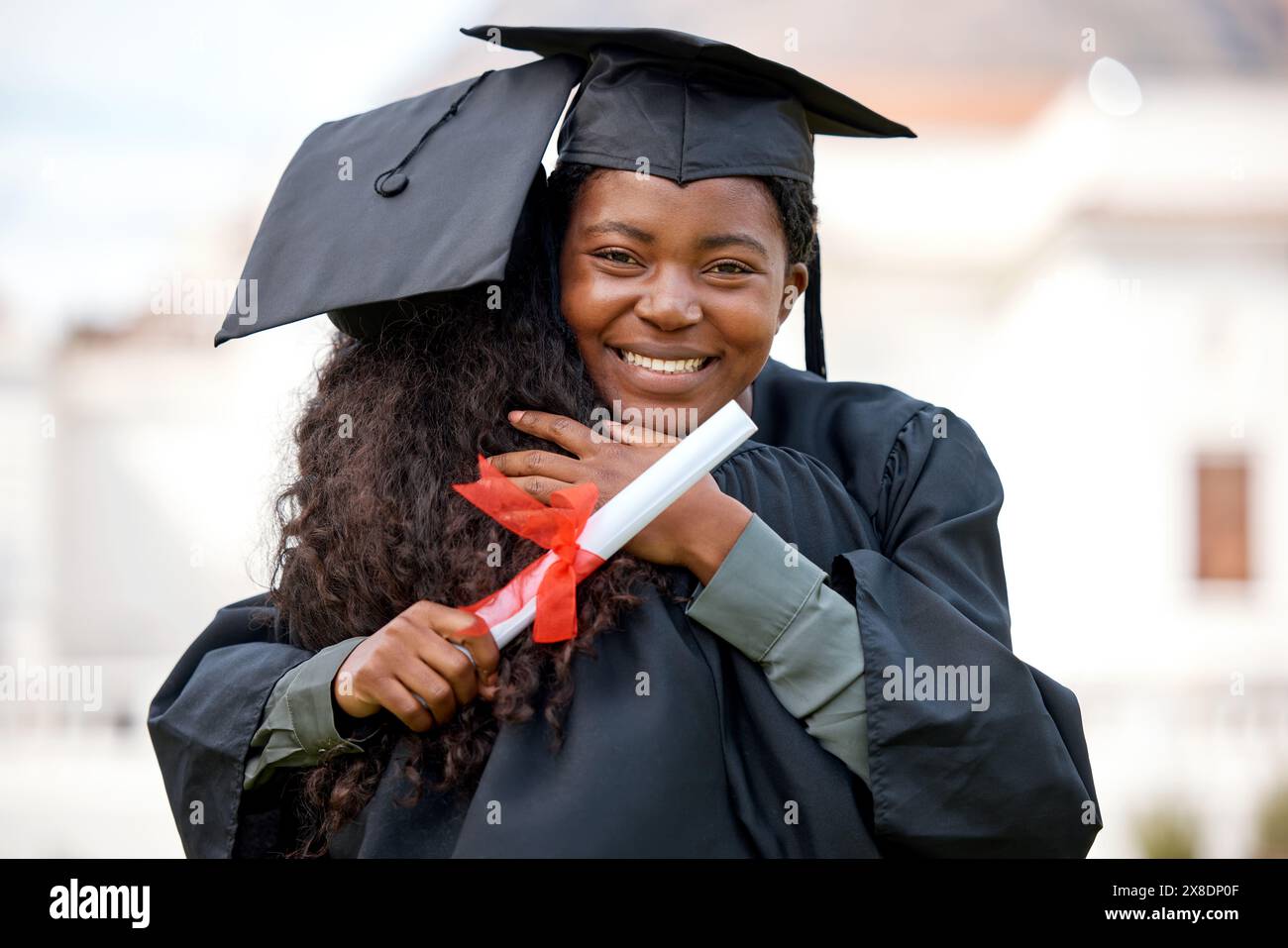 Portrait, black woman and happy with hug for graduation on campus for ...