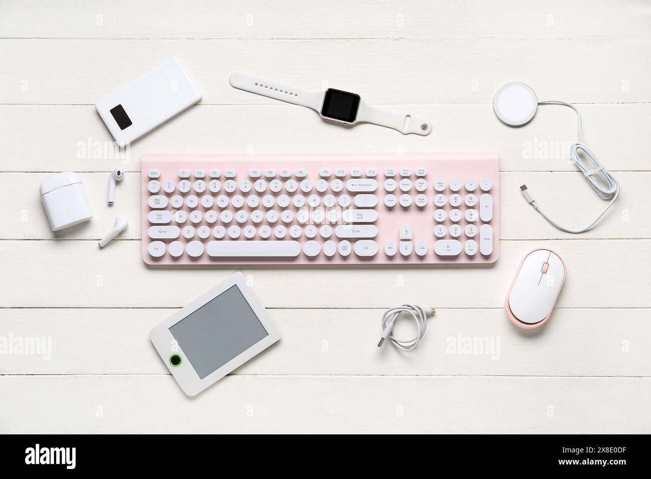 Composition with different modern gadgets on white wooden background Stock Photo
