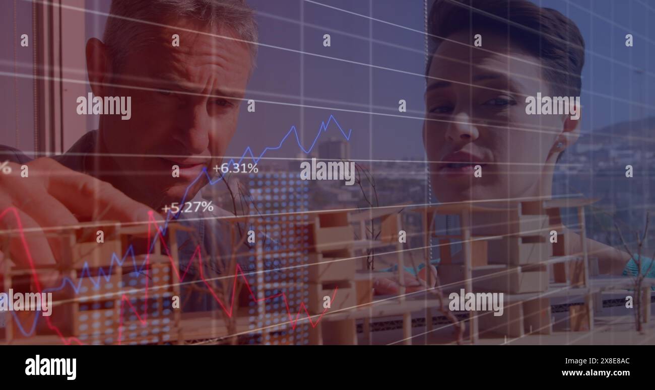 Image of data processing over diverse male and female architects discussing over a model Stock Photo