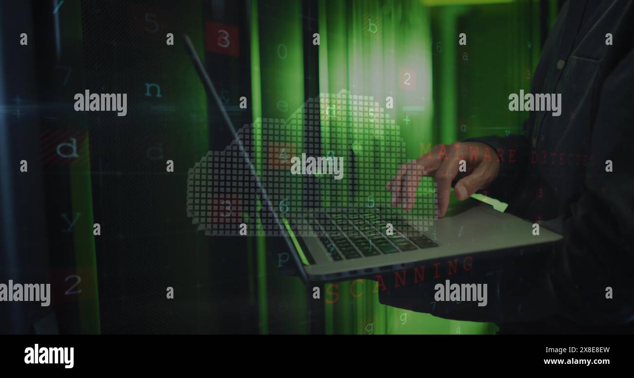 Image of cloud and data processing over asian man using laptop Stock Photo