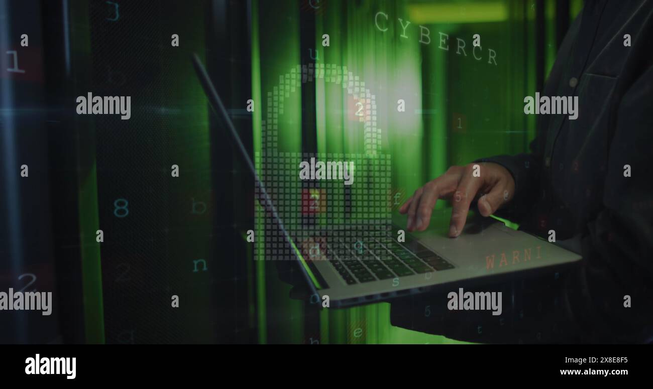 Image of cloud and data processing over asian man using laptop Stock Photo