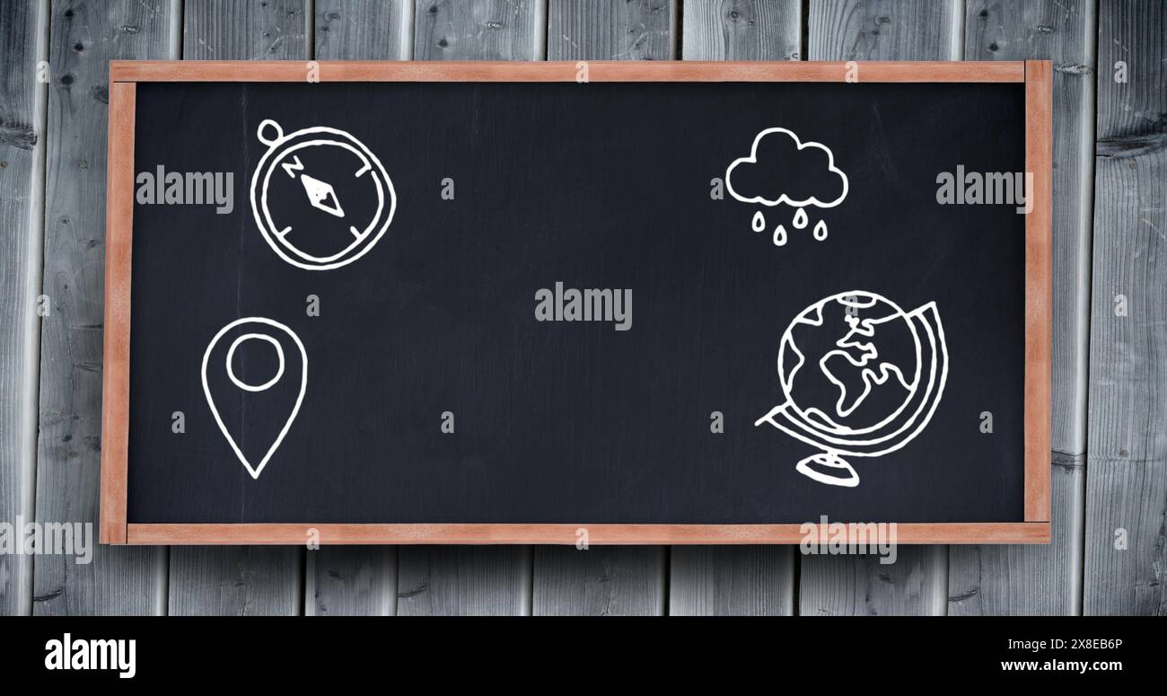 In school, a compass, rain cloud, and globe are drawn on the blackboard ...