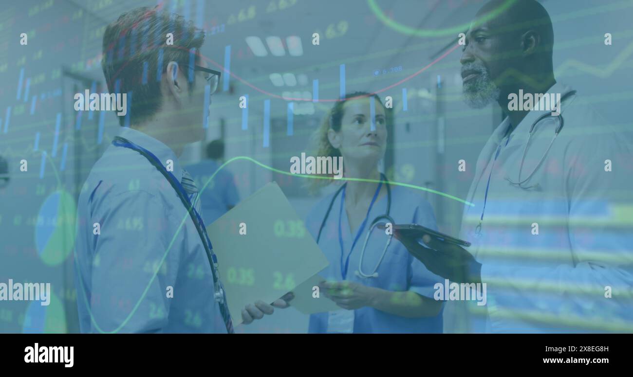 Image of data processing over diverse doctors Stock Photo