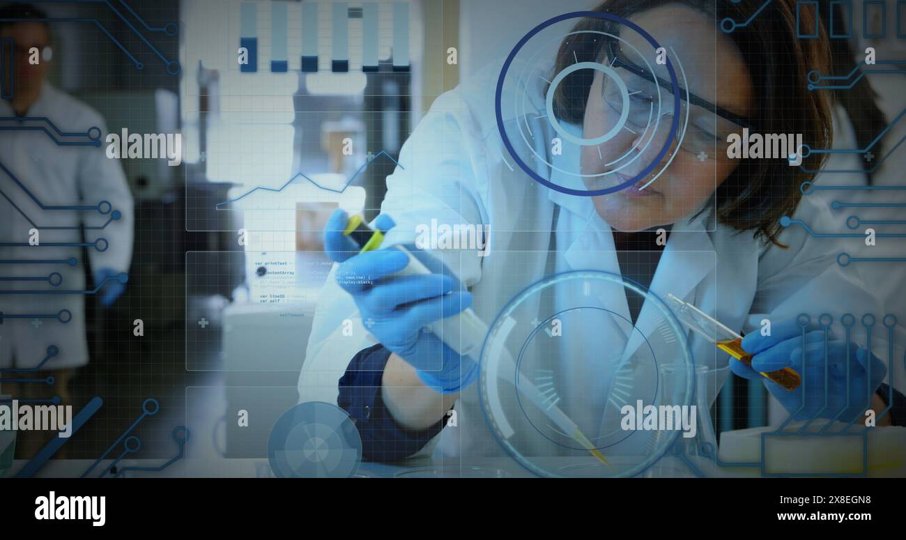 Image of graphs, loading circles, caucasian female scientist taking liquid sample from test tube Stock Photo