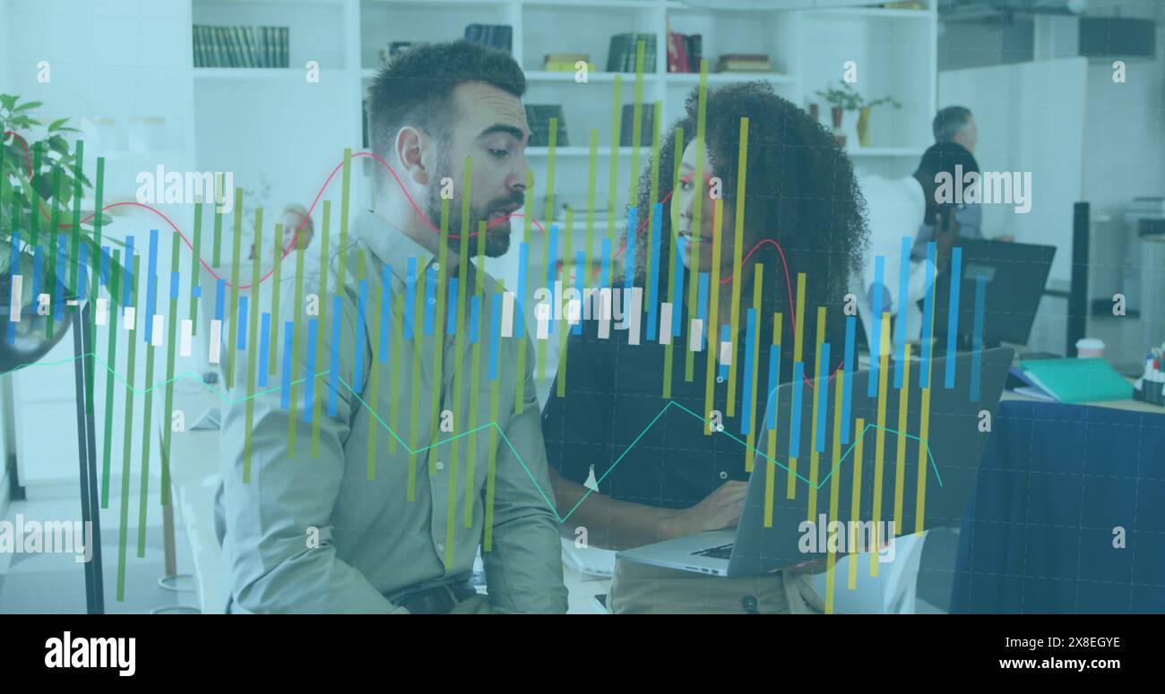 Image of graphs over diverse coworkers discussing reports on laptop in ...