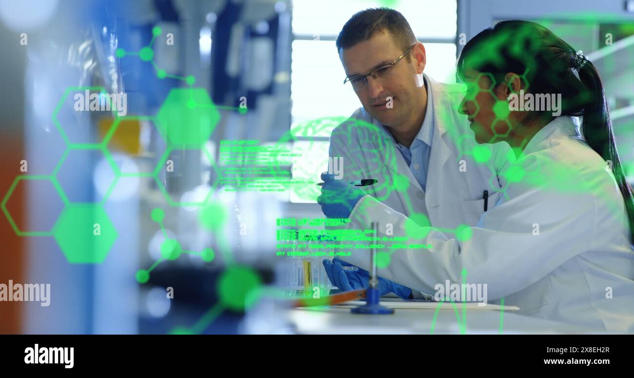 Image of medical data processing over diverse male and female scientists working at laboratory Stock Photo