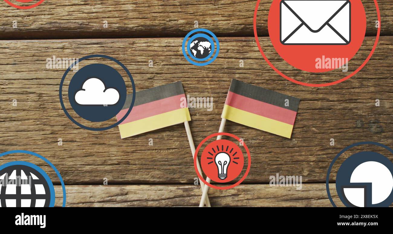 Image of digital media icons over german flags on wooden background ...