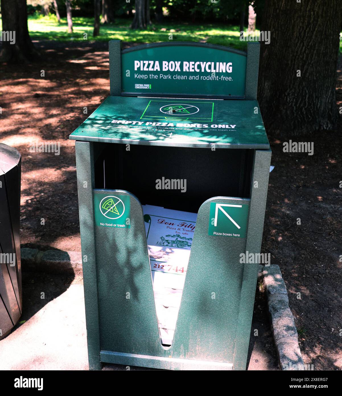Pizza box recycling bin installed nearby a popular picnics place in Central Park. This is a