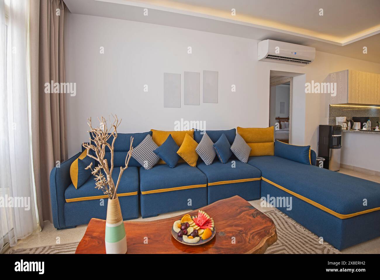 View of Living room lounge area in luxury apartment show home showing interior ...
