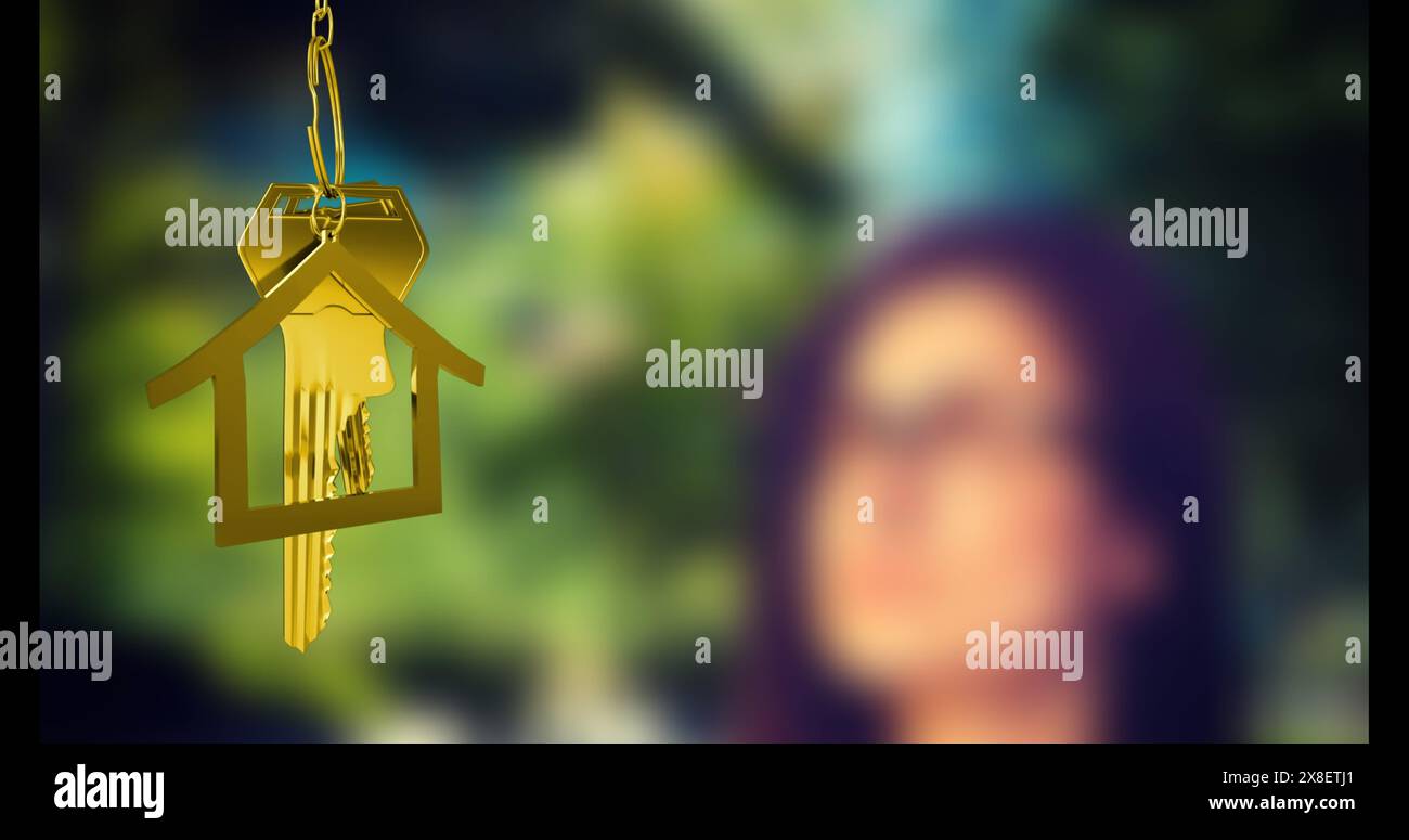 Caucasian professional in purple blouse stands by a house-shaped wind chime Stock Photo