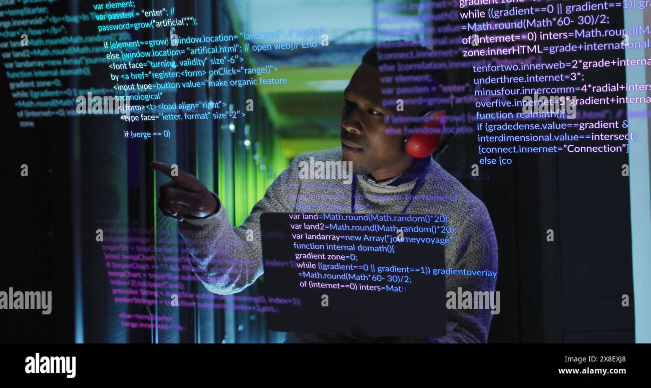 Image of data processing over african american male engineer with laptop working at server room Stock Photo