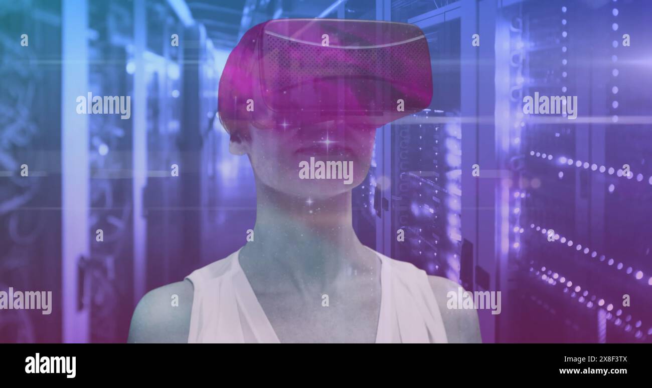 Caucasian female manager in VR headset, standing with short blonde hair ...