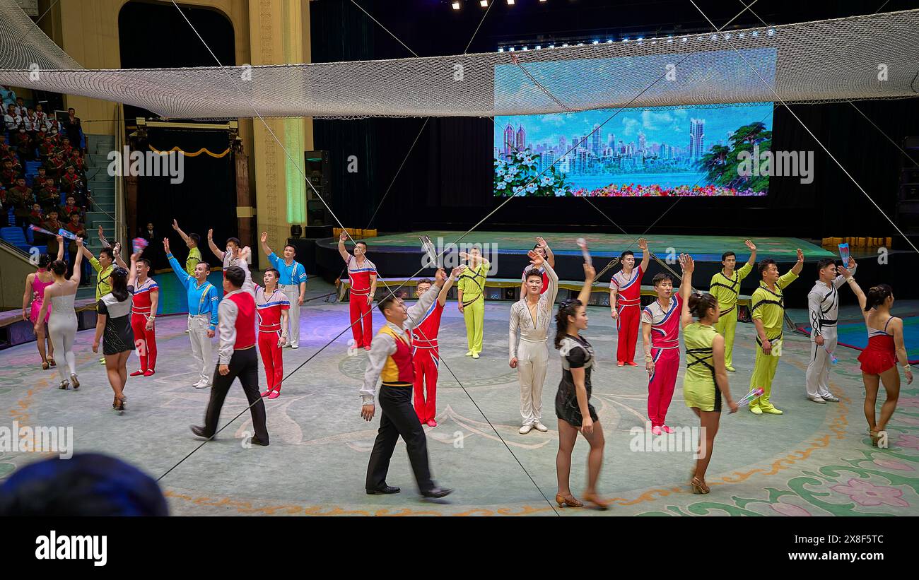 Pyongyang Circus Pioneers, teenagers after a circus performance on the square at the ...