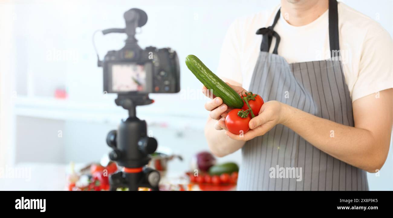 Comic Culinary Blogger Holding Organic Vegetables Stock Photo