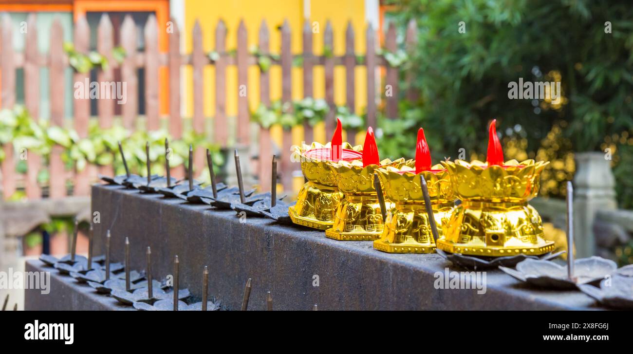 Panorama of golden candles at the Lingyin Temple in Hangzhou, China Stock Photo