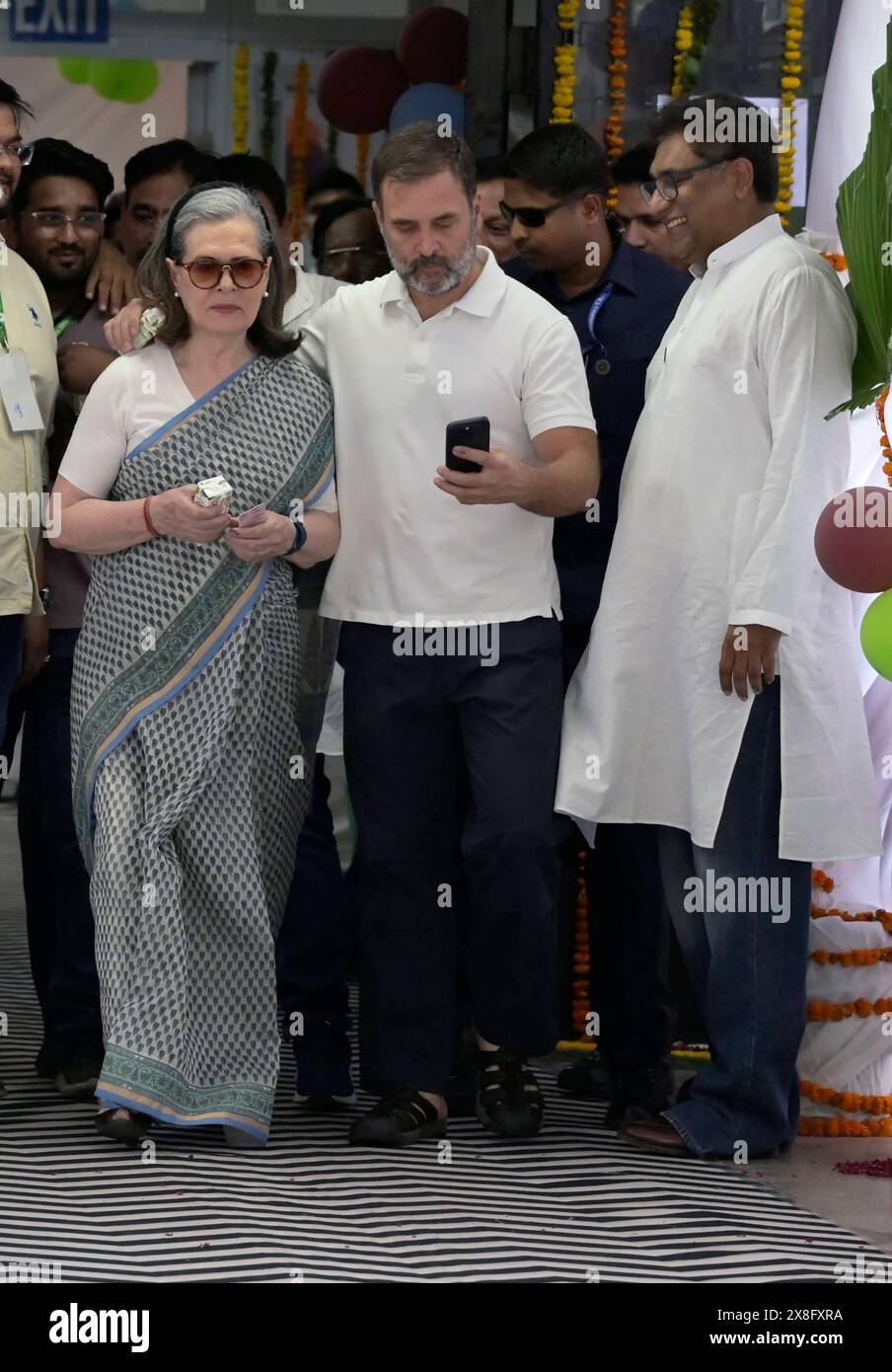 New Delhi, India. 25th May, 2024. Congress party leaders Rahul and Sonia Gandhi coming out of a polling booth after casting their votes in the ongoing Parliamentary Election in New Delhi. (Photo by Sondeep Shankar/Pacific Press) Credit: Pacific Press Media Production Corp./Alamy Live News Stock Photo
