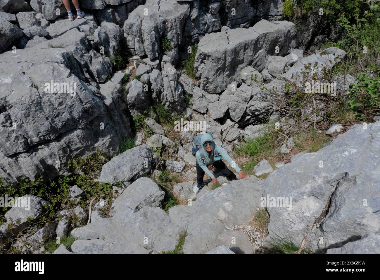 Climbing limestone fissures to Subra peak Orjen Mountains Herceg Novi Climbing limestone fissures to Subra peak Orjen Mountains Herceg Novi