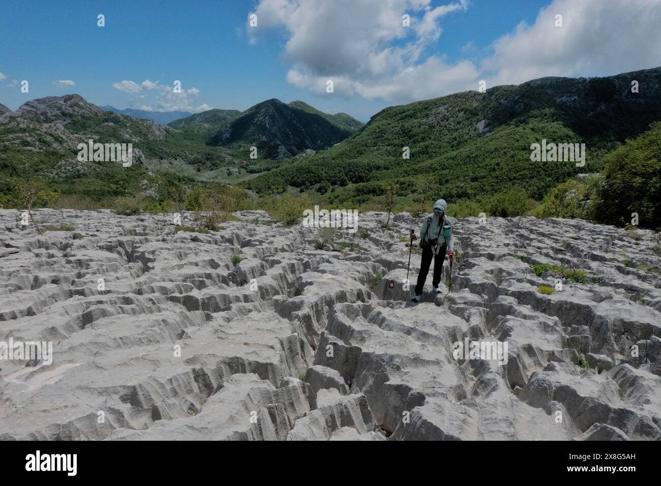 Climbing limestone fissures to Subra peak Orjen Mountains Herceg Novi Climbing limestone fissures to Subra peak Orjen Mountains Herceg Novi