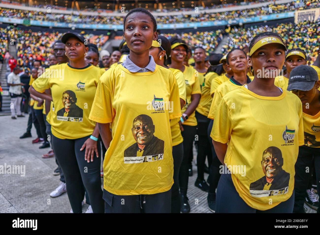 a-youth-group-listens-as-president-cyril-ramaphosa-speaks-during-the