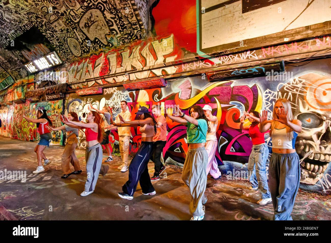 London Leake Street The Graffiti Tunnel hip hop dancing group inside the tunnel Stock Photo