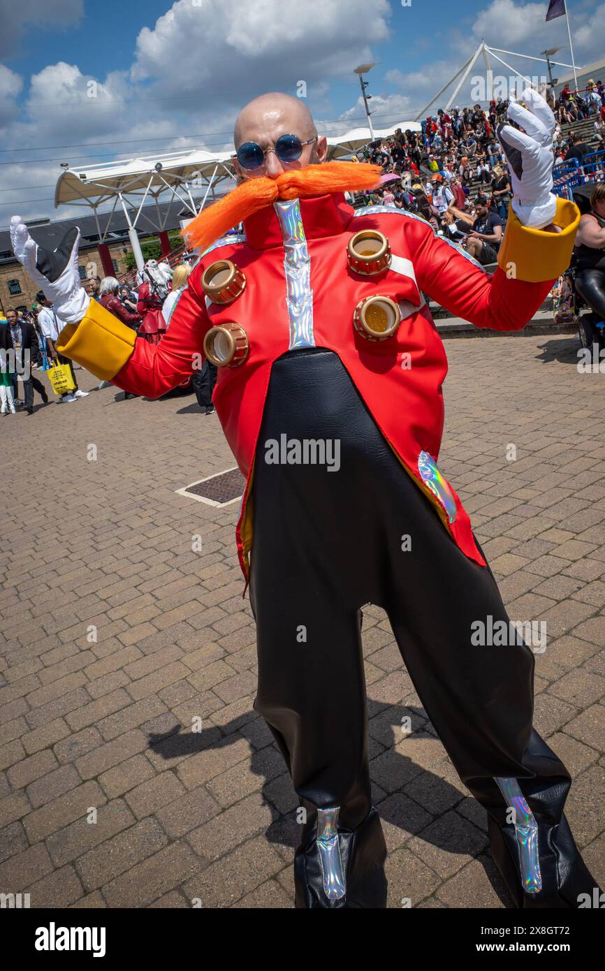 London, UK, 25th May, 2024. A visitor dressed as Doctor Eggman poses outside at Comic Con London. Credit: James Willoughby/Alamy Live News Stock Photo