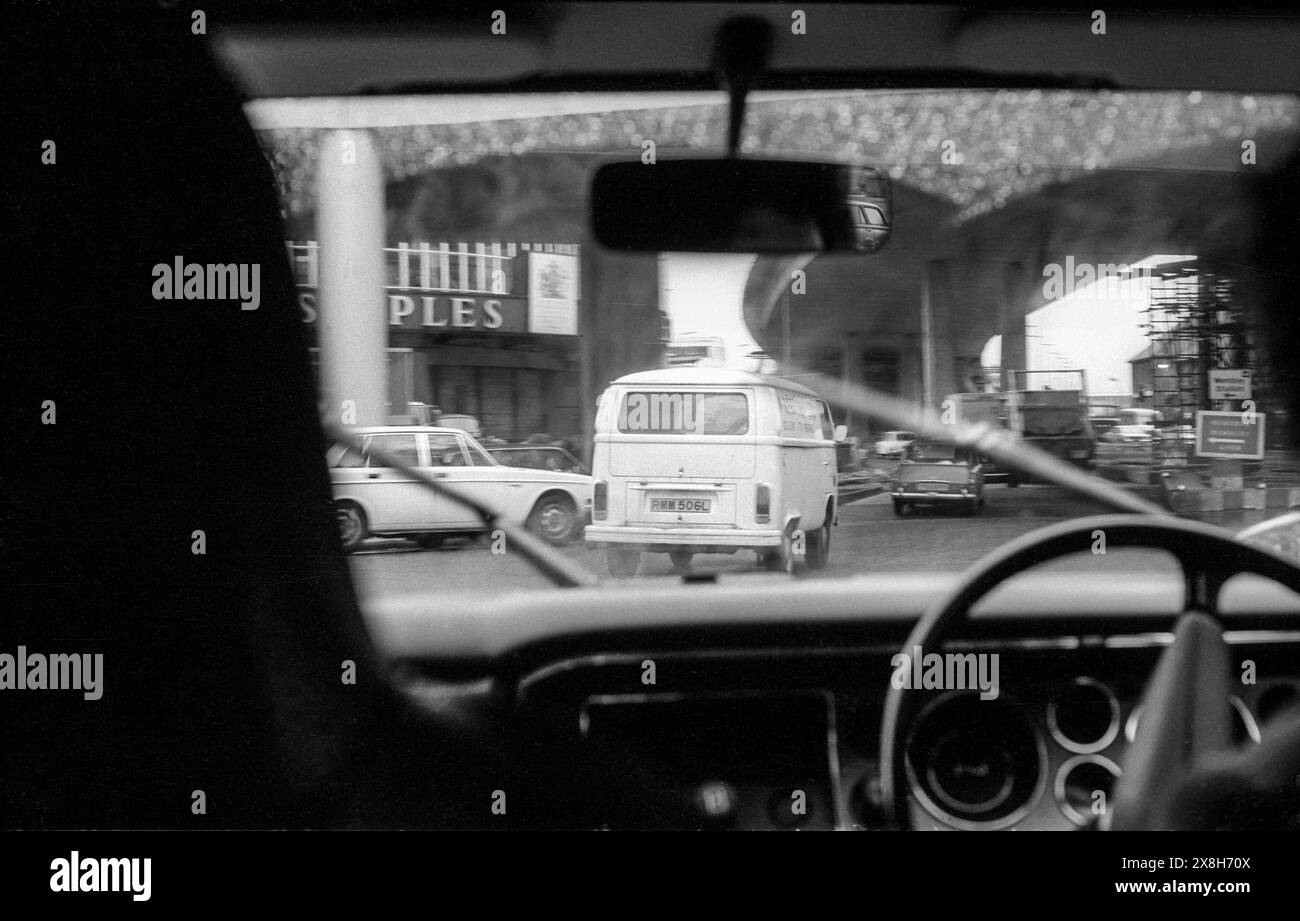 1970s black & white archive photograph of the view from inside a car travelling round Staples Corner at the junction of the A406 North Circular and A5 Edgware Road - the start of the M1 motorway. Stock Photo