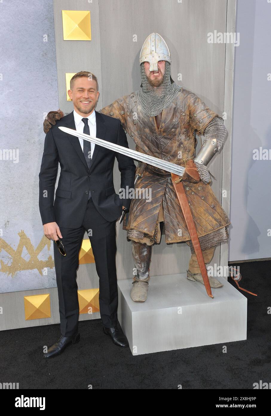 Charlie Hunnam at the Los Angeles premiere of 'King Arthur: Legend Of ...