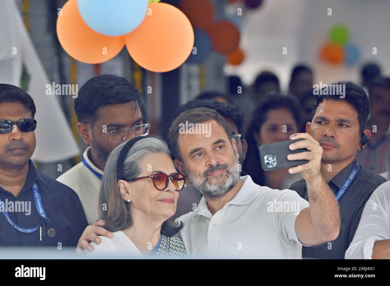 NEW DELHI, INDIA - MAY 25: Congress leader Rahul Gandhi clicks a selfie with his mother Sonia Gandhi after casting his vote at a polling booth during the sixth phase of Lok Sabha elections, on May 25, 2024 in New Delhi, India. Polling for the sixth phase of general elections concluded in 58 constituencies across six states and two Union territories, including all seven seats in Delhi. Voter turnout across six states and two Union Territories during Phase 6 polling has been recorded at approximately 58.84 per cent, according to the Voter Turnout App of the Election Commission. (Photo by Sanjeev Stock Photo