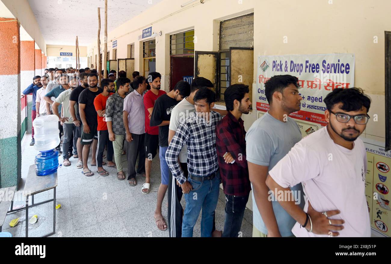 NEW DELHI, INDIA - MAY 25: People seen inside a polling booth to cast ...