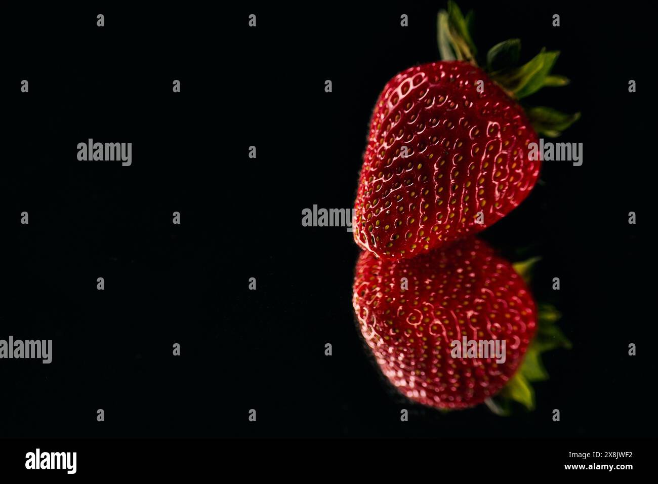Strawberry seeds up close hi-res stock photography and images - Alamy
