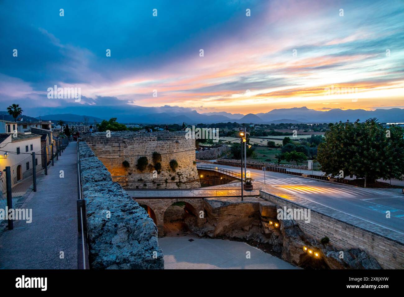Evening Tour Through The Ancient Old Town Of Alc dia Stock Photo Alamy