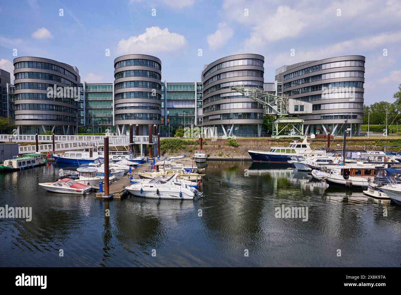 Five Boats office building by architect Sir Nicholas Grimshaw & Partners and the marina in the inner harbour of Duisburg, Ruhr district, independent Stock Photo